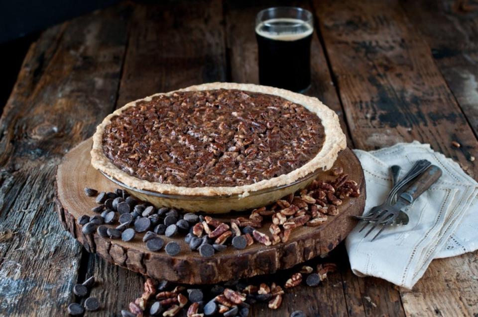 <p>Jackie Dodd</p><p>The nutty sweetness of that Southern charmer, the pecan pie, is a perfect match for the malty flavors of a good dark beer. </p><p><strong>Get the recipe: </strong><strong><a href="https://parade.com/237048/jackiedodd/chocolate-beer-pecans/" rel="nofollow noopener" target="_blank" data-ylk="slk:Chocolate Porter Pecan Pie Recipe;elm:context_link;itc:0;sec:content-canvas" class="link ">Chocolate Porter Pecan Pie Recipe</a></strong></p>