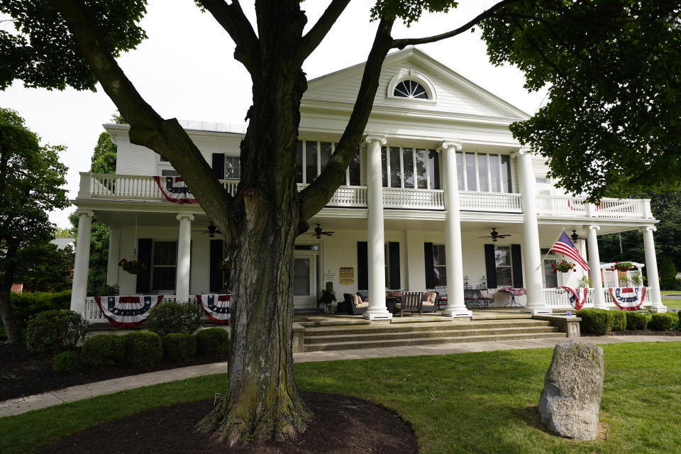 A building that formed part of the Carlisle Indian Industrial School campus is seen at U.S. Army's Carlisle Barracks, Friday, June 10, 2022, in Carlisle, Pa. The Army is continuing a multi-phase project to disinter the remains of indigenous children who died more than a century ago while attending the government-run boarding school at the site and reunite them with their families. (AP Photo/Matt Slocum)