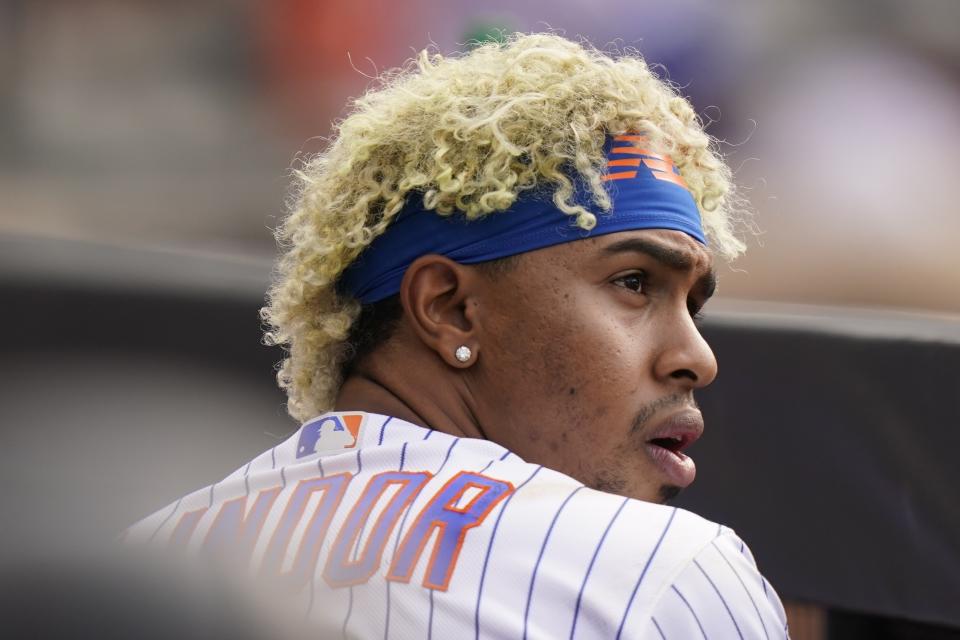 New York Mets' Francisco Lindor looks at the scoreboard during the fourth inning of a baseball game against the San Diego Padres, Saturday, June 12, 2021, in New York. (AP Photo/Frank Franklin II)