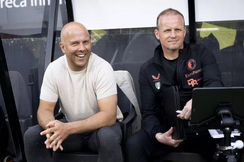 Arne Slot and his assistant Sipke Hulshoff on the bench at Feyenoord.