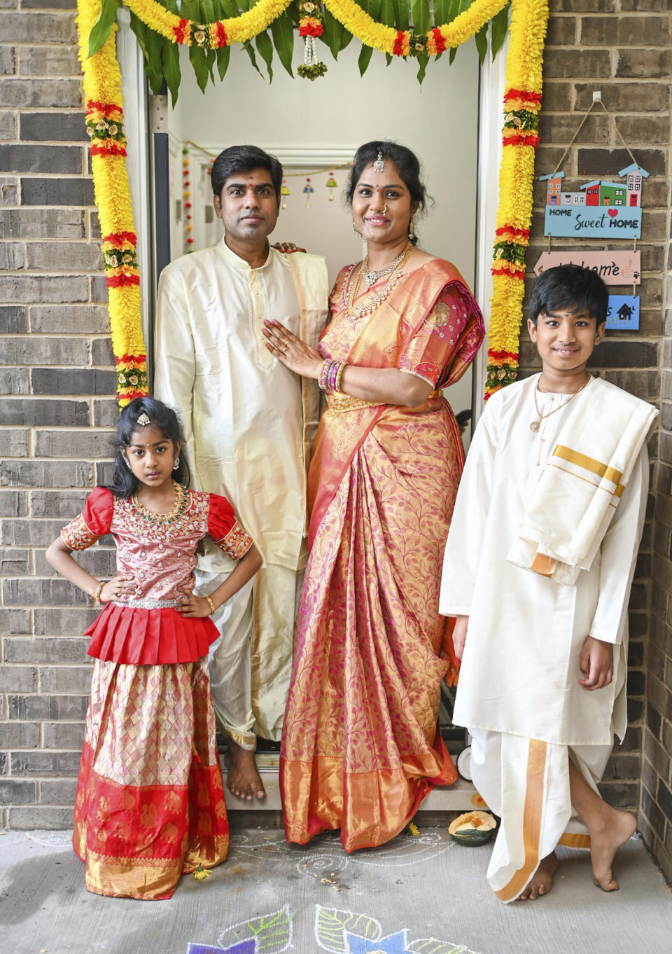 This undated photo provided by the Alaparthi Family shows Supraja Alaparthi, center right, and her family. Attorneys representing the family have filed a wrongful death lawsuit against the captain, a crew member and a Florida resort company that owns the marina where the boat was based. (Alaparthi Family via AP)