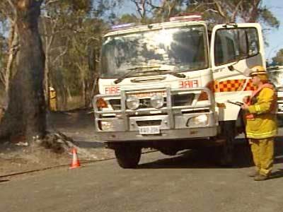 <p>Crews mop up yesterday's fire near Clarendon.</p>