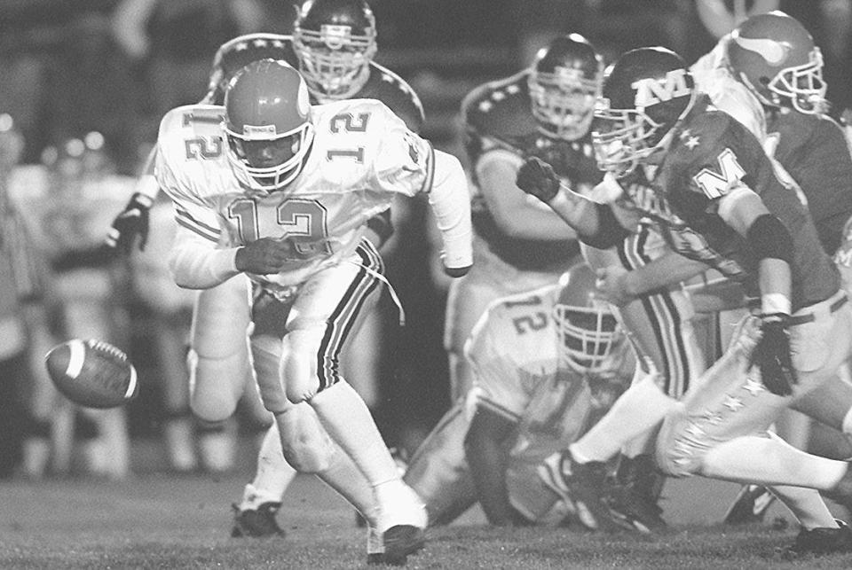 NOVEMBER 1, 1996: Princeton quarterback Vincent Harrison fumbles on an option play against Moeller resulting in a free ball. Luckily, it took a "Princeton bounce" right back into his hands.