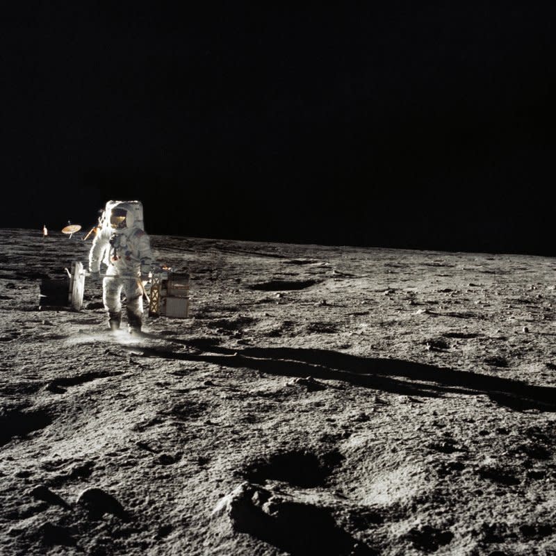 Astronaut Alan Bean walks on the surface of the moon November 19, 1969, as part of Apollo 12. File Photo courtesy of NASA