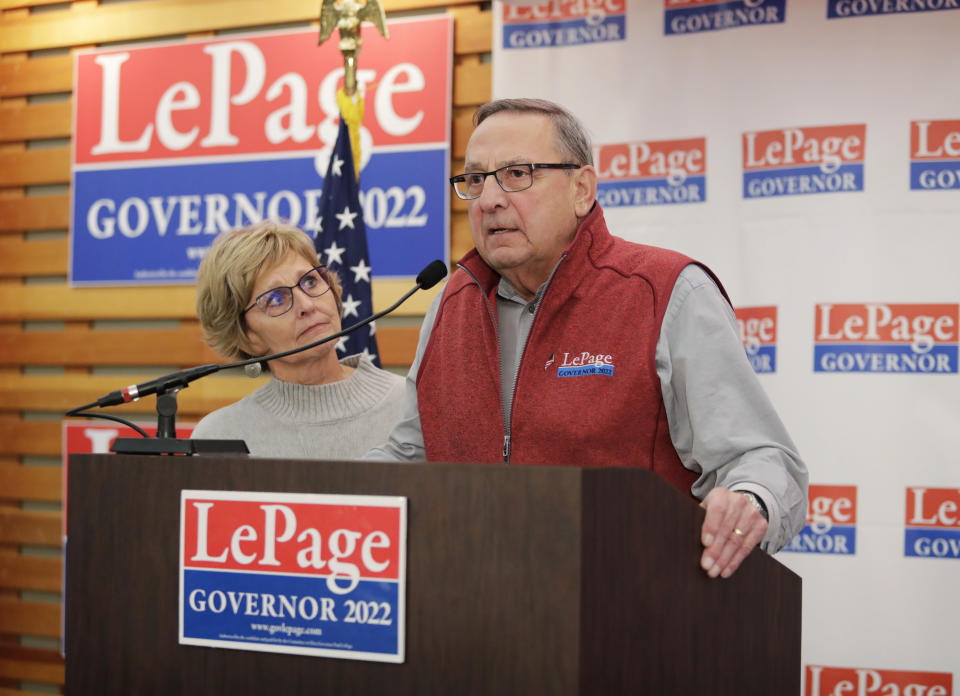 Republican Paul LePage, right, joined by his wife, Ann, speaks to supporters Tuesday, Nov. 8, 2022, in Lewiston, Maine. LePage is running against Democratic Gov. Janet Mills. (AP Photo/Joel Page)