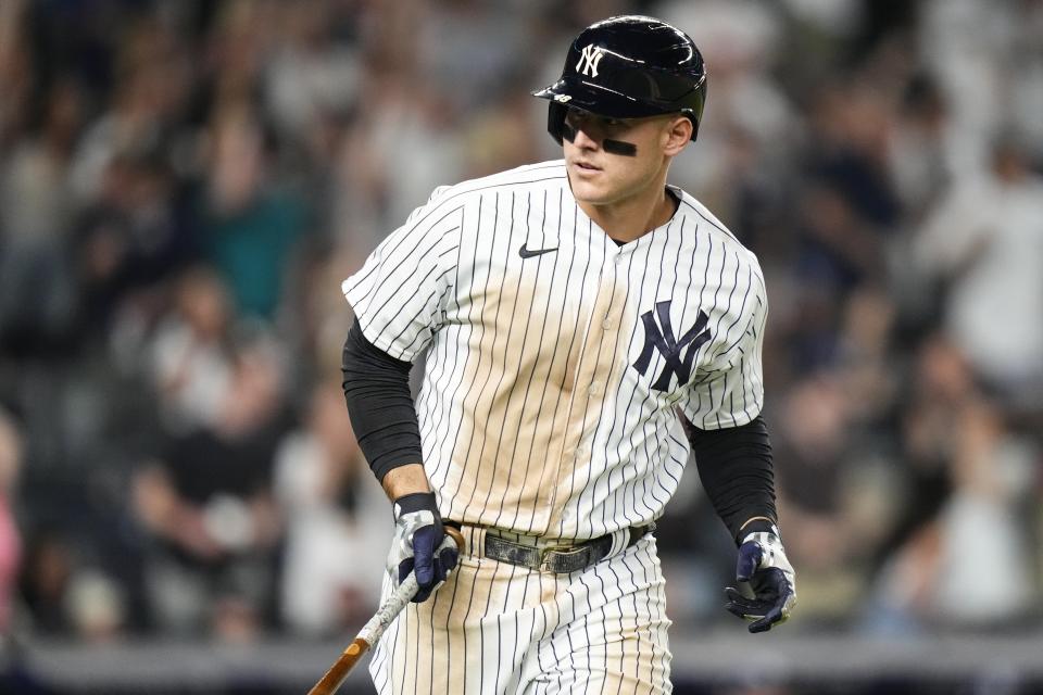 New York Yankees' Anthony Rizzo tosses his bat as he runs the bases after hitting a two-run home run against the Tampa Bay Rays during the eighth inning of a baseball game Friday, May 12, 2023, in New York. (AP Photo/Frank Franklin II)