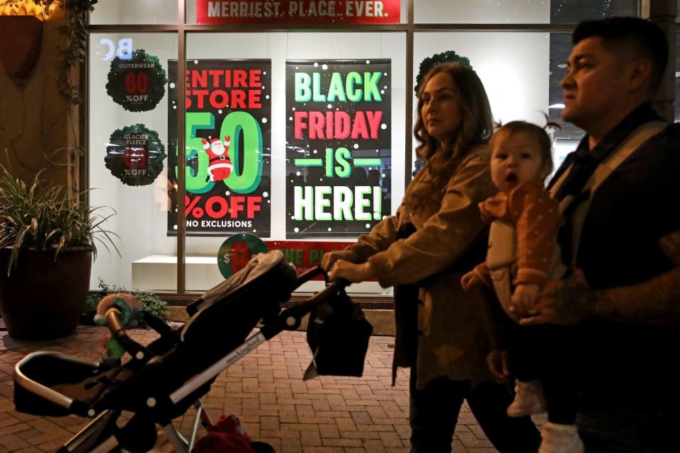 Shoppers enjoy exclusive Black Friday deals at the Citadel Outlets in Commerce.