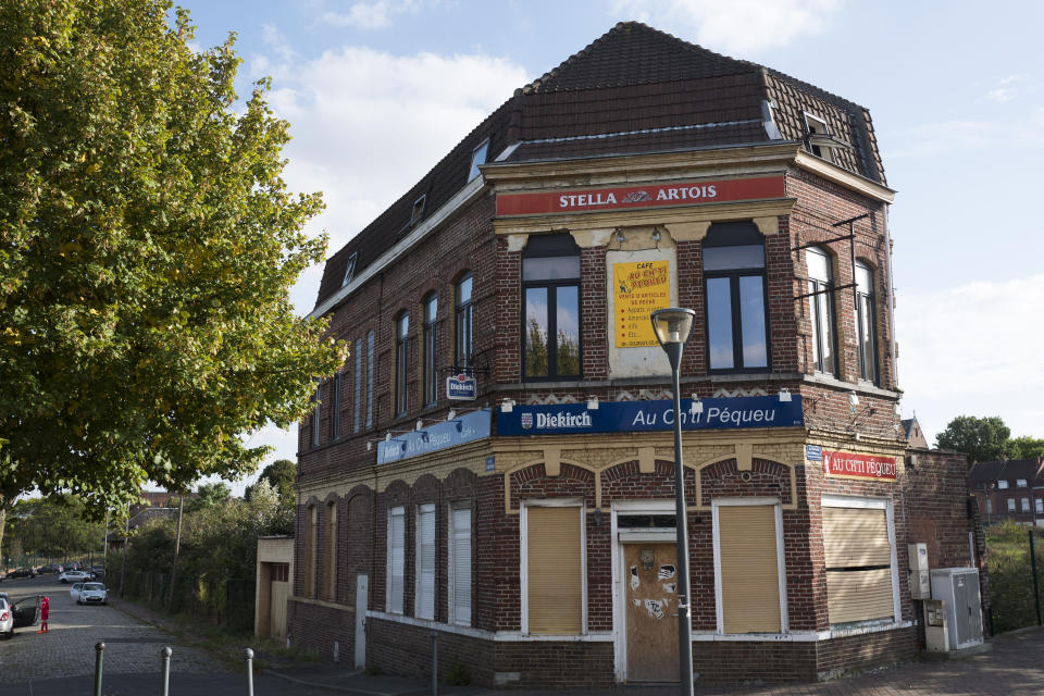 A closed cafe is pictured in Roubaix, northern France, Tuesday Sept.17, 2019. A mass die-off of France's bars, from 200,000 in 1960 to 36,000 now, fed into the sense of isolation and abandonment that was a driving force behind the so-called "yellow vest" protest movement that rocked France this year. (AP Photo/Michel Spingler)