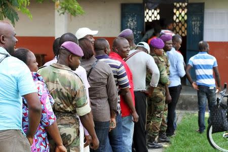 Military personnel vote at a polling station in Brazzaville, Congo, October 25, 2015. REUTERS/Roch Baku