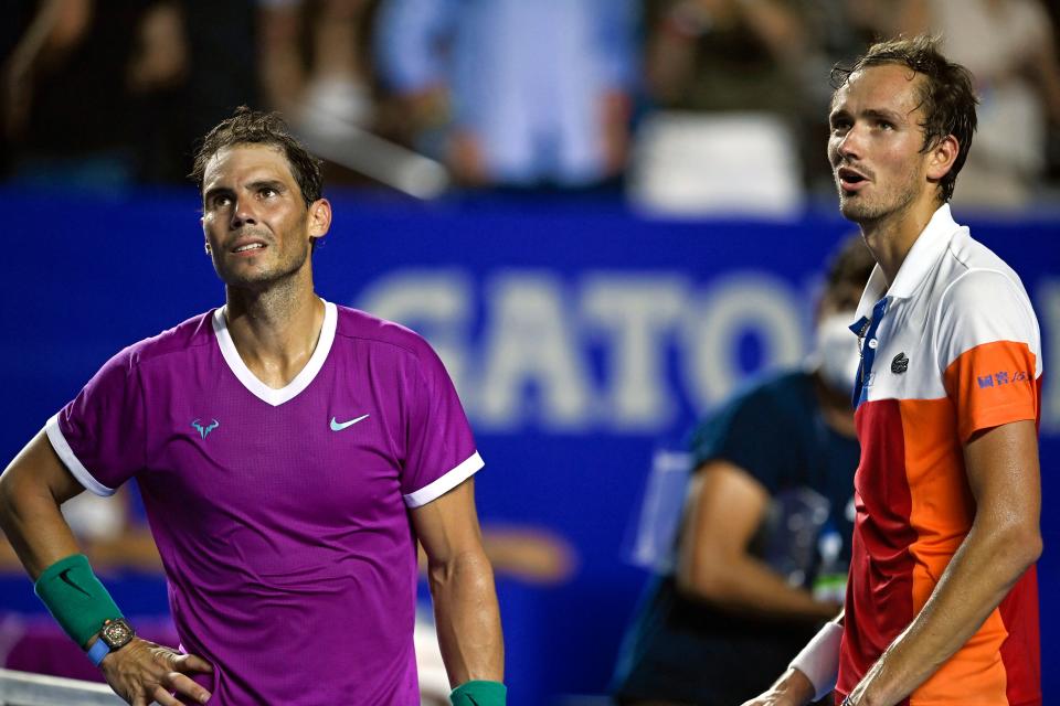 Rafa Nadal (pictured left) speaks with Daniil Medvedev (pictured right) at the net during the Mexican Open.