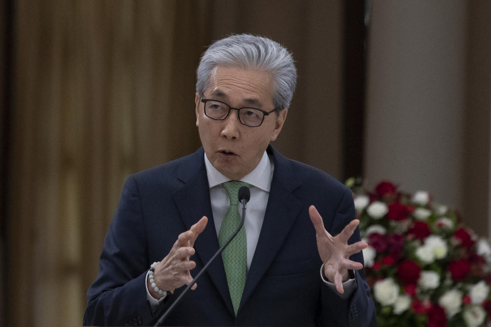 Thailand 's Deputy Prime Minister Somkid Jatusripitak talks to reporters during a press conference in Bangkok, Thailand, on Nov. 29, 2019. Four key Cabinet ministers submitted their resignations Thursday, July 16, 2020 as a military clique within the ruling party continues to consolidate power. The most prominent member to depart was Somkid who has been in several governments during the past 19 years and who has been overseeing recent economic stimulus packages. (AP Photo/Sakchai Lalit)