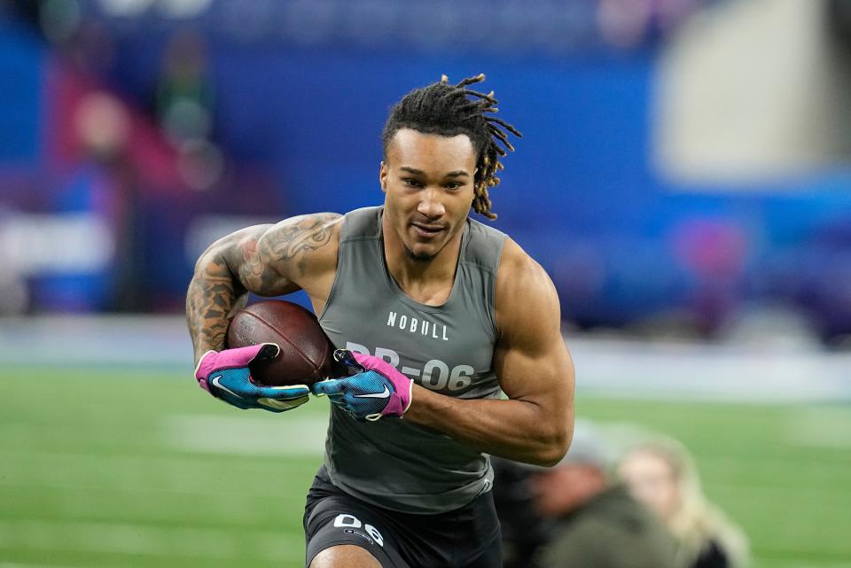 Alabama defensive back Brian Branch runs a drill at the NFL football scouting combine in Indianapolis, Friday, March 3, 2023. (AP Photo/Darron Cummings)