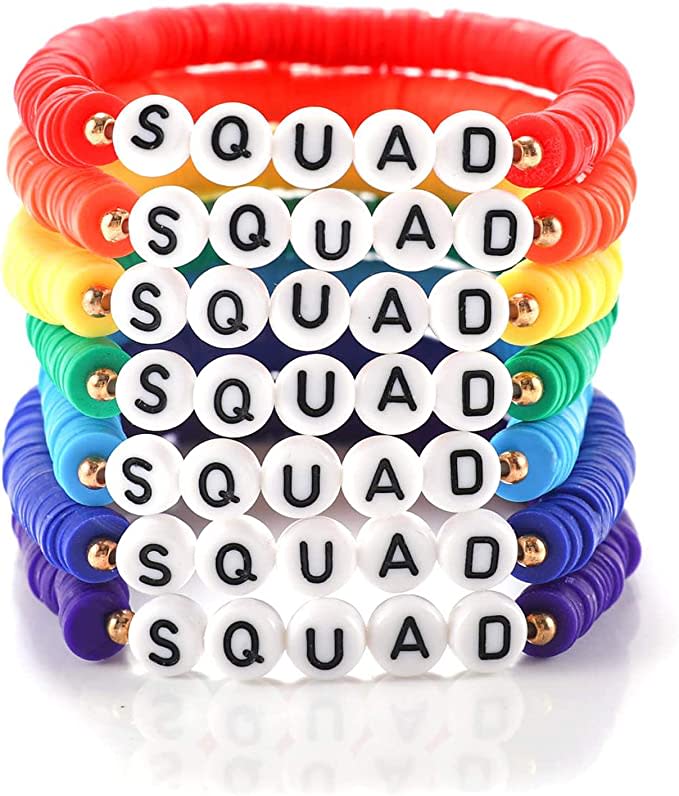 Seven different colored friendship bracelets that read "squad"