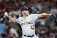 Milwaukee Brewers relief pitcher Brad Boxberger throws against the Atlanta Braves during the sixth inning of a baseball game Friday, July 30, 2021, in Atlanta. (AP Photo/Hakim Wright Sr.)
