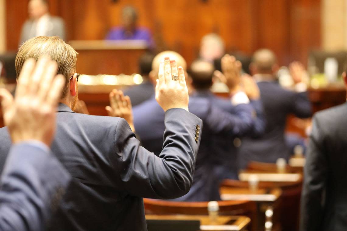 South Carolina House members take the oath of office on Tuesday, Dec. 6, 2022, in the House chambers in Columbia, South Carolina. (AP Photo/Jeffrey Collins)