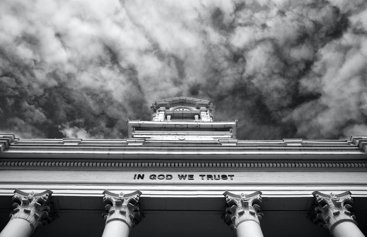 <span class="caption">Christian nationalists are pushing for 'In God We Trust' to be omnipresent.</span> <span class="attribution"><a class="link " href="https://www.gettyimages.com/detail/photo/in-god-we-trust-royalty-free-image/525213315?adppopup=true" rel="nofollow noopener" target="_blank" data-ylk="slk:Joe Longobardi Photography via Getty Images;elm:context_link;itc:0;sec:content-canvas">Joe Longobardi Photography via Getty Images</a></span>