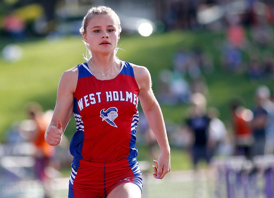 West Holmes High School's Jasmine Giauque competes in the 100 meter dash at the Ohio Cardinal Conference track meet held at Ashland University on Friday, May 13, 2022. TOM E. PUSKAR/TIMES-GAZETTE.COM