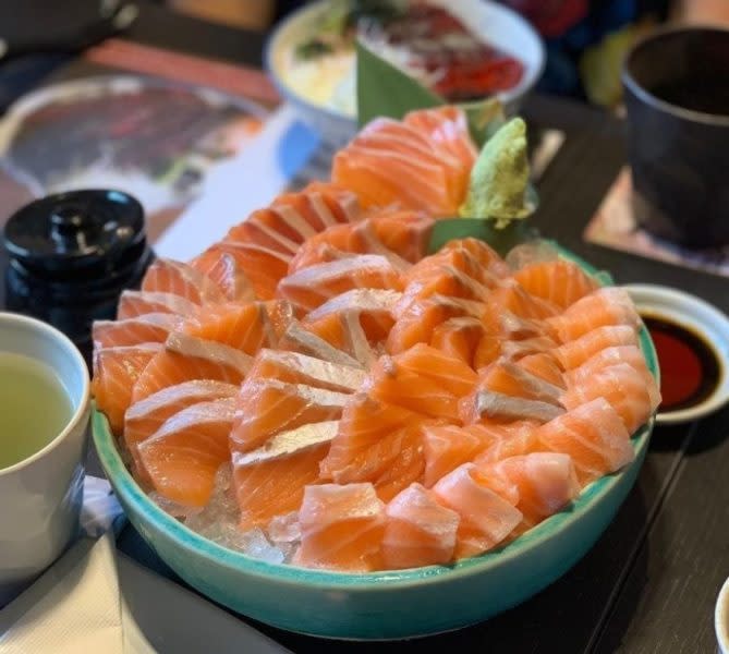 foodie places for awesome birthday perks - salmon slices