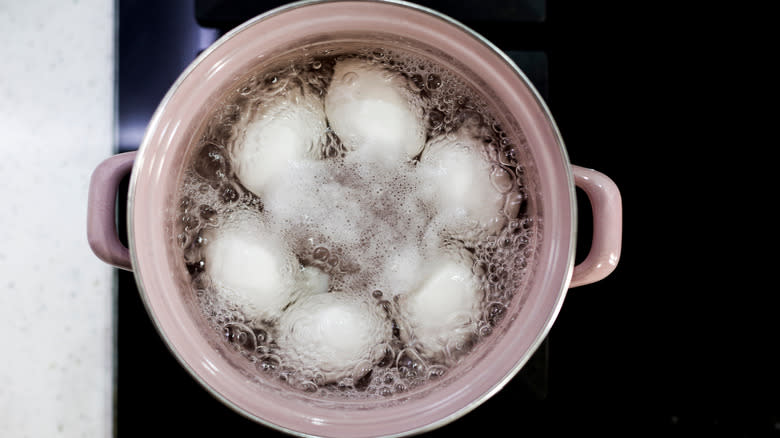 boiling eggs in pot