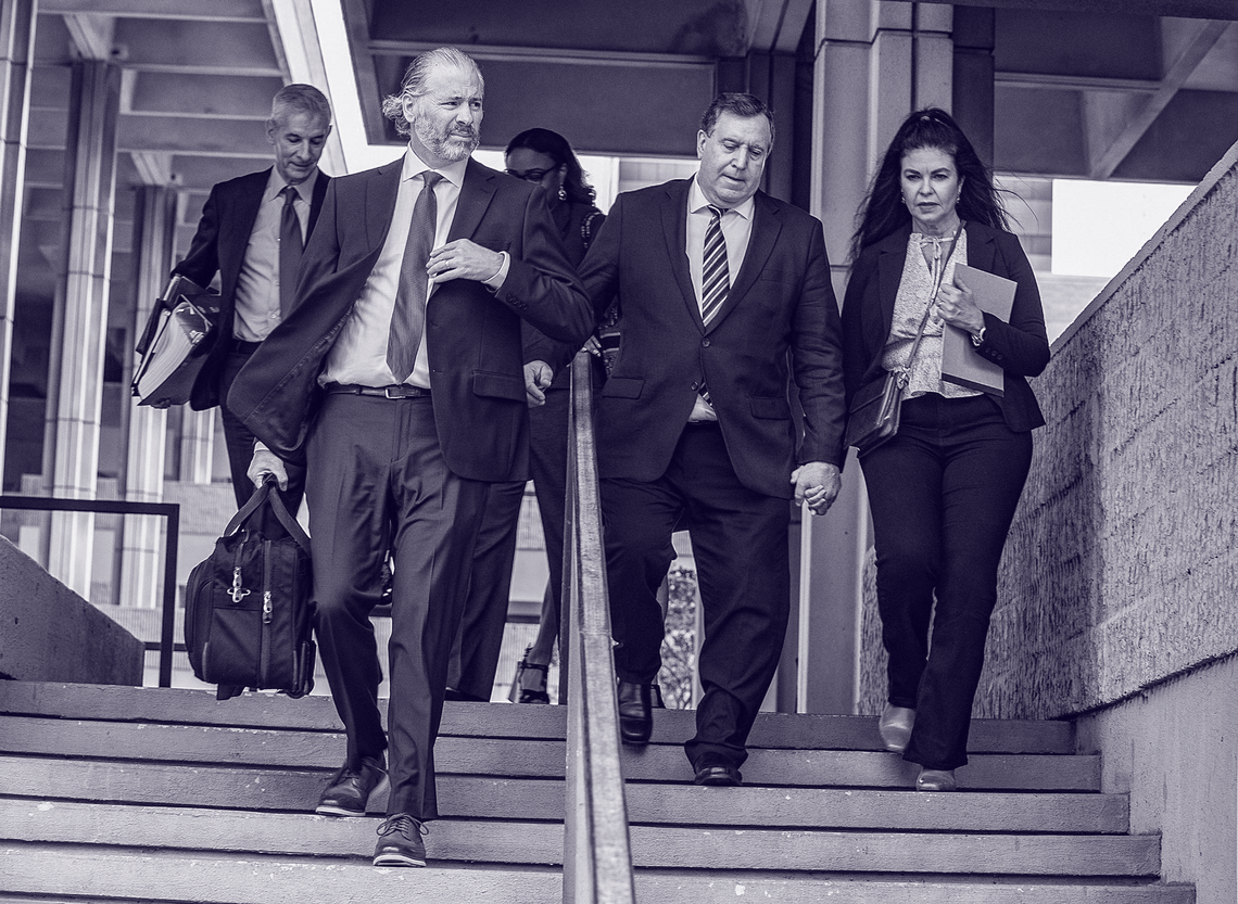 Miami Commissioner Joe Carollo is seen leaving federal court in Fort Lauderdale with his wife and two of his attorneys. Public records recently obtained by the Miami Herald show that Miami taxpayers have been footing the commissioner’s legal costs and so far have been billed almost $2 million.