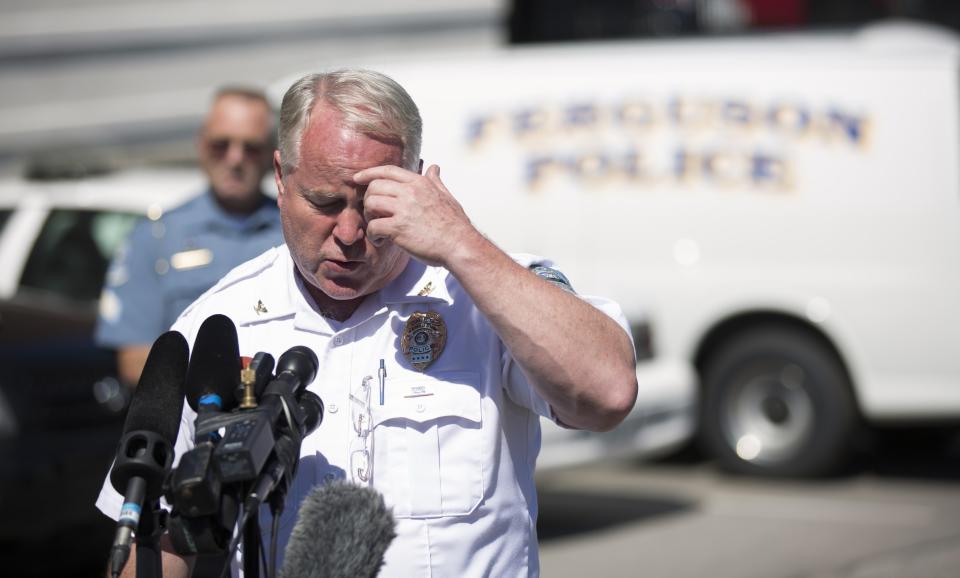 Police Chief Thomas Jackson speaks during a news conference at the police headquarters in Ferguson, Missouri August 13, 2014. The police officer involved in the fatal shooting of an unarmed black teenager last weekend in Ferguson, Missouri, an incident that has sparked repeated and sometimes violent racially charged protests, was injured in the encounter and treated for a facial injury, the city's chief of police Jackson said on Wednesday. REUTERS/Mario Anzuoni (UNITED STATES - Tags: CRIME LAW)