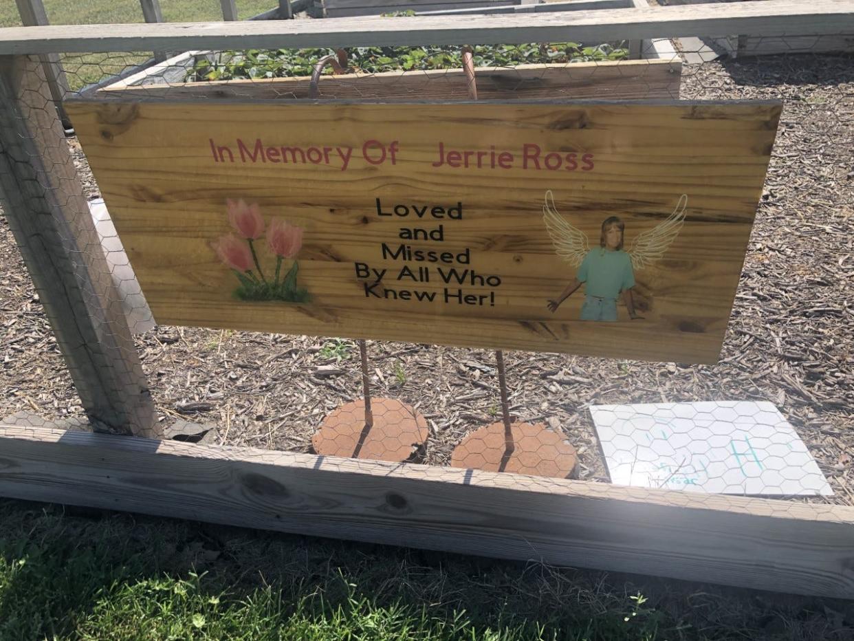 A dedication to Jerrie Ross stands at the entrance to the community garden at Countryside United Methodist Church. A man charged with her murder was found not guilty of all counts Thursday in Shawnee County District Court.