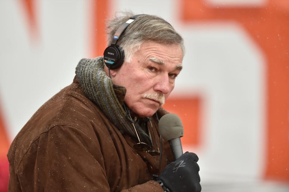 Former Cleveland Browns lineman and current radio broadcaster Doug Dieken works from the field before a game against the Cincinnati Bengals, Dec. 11, 2016, in Cleveland. (AP Photo/David Richard, File)
