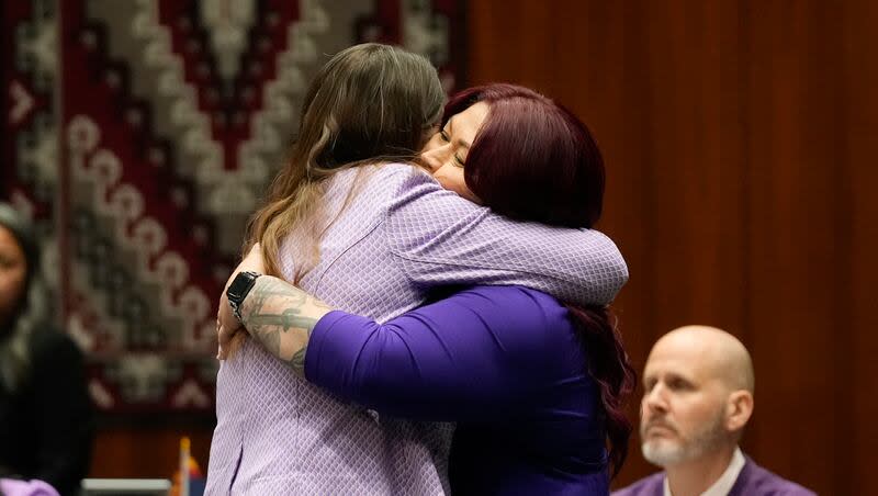 Arizona Rep. Stephanie Stahl Hamilton, D-Tucson, left, gets a hug from Sen. Anna Hernandez, D-Phoenix, after the vote tally on the proposed repeal of Arizona's near-total ban on abortions winning approval from the state House, Wednesday, April 24, 2024, in Phoenix.