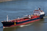 In this June 14, 2012 photo, the ship that would later become the Asphalt Princess sails through Quebec City, Canada. The hijackers who captured the Asphalt Princess off the coast of the United Arab Emirates in the Gulf of Oman departed the targeted ship on Wednesday, Aug. 4, 2021, the British navy reported, as recorded radio traffic appeared to reveal a crew member onboard saying Iranian gunmen had stormed the asphalt tanker. (Steve Geronazzo via AP)