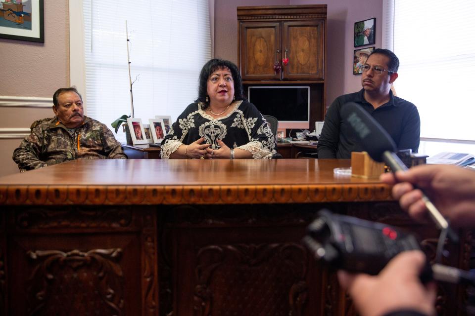 Attorney Yvonne K. Quintana, middle, speaks during a news conference about the civil suit 15 residents of Anthony filed to remove the Mayor of Anthony on Saturday, Nov. 4, 2023, at the Law Offices of Yvonne k. Quintana.