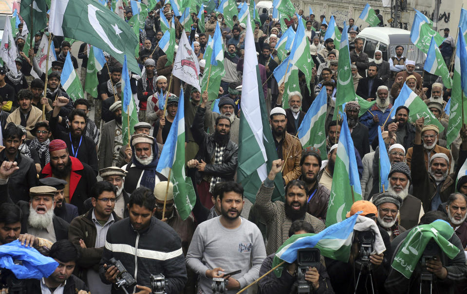 Supporters of Jamaat-e-Islami, a religious political party, chant slogans during an anti-Indian rally in Lahore, Pakistan, Sunday, March 3, 2019. Residents near the disputed boundary in the divided Kashmir region said Sunday that it was quiet overnight, their first lull since a dangerous escalation between Pakistan and India erupted last week bringing the two nuclear-armed rivals close to full-out war. (AP Photo/K.M. Chaudary)