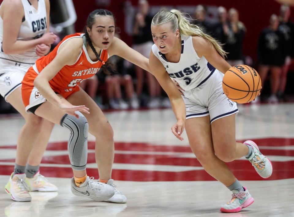 Skyridge’s Bella Sika guards Syracuse’s Avery Sanders during a 6A girls quarterfinal basketball game at the Huntsman Center in Salt Lake City on Monday, Feb. 26, 2024. | Kristin Murphy, Deseret News