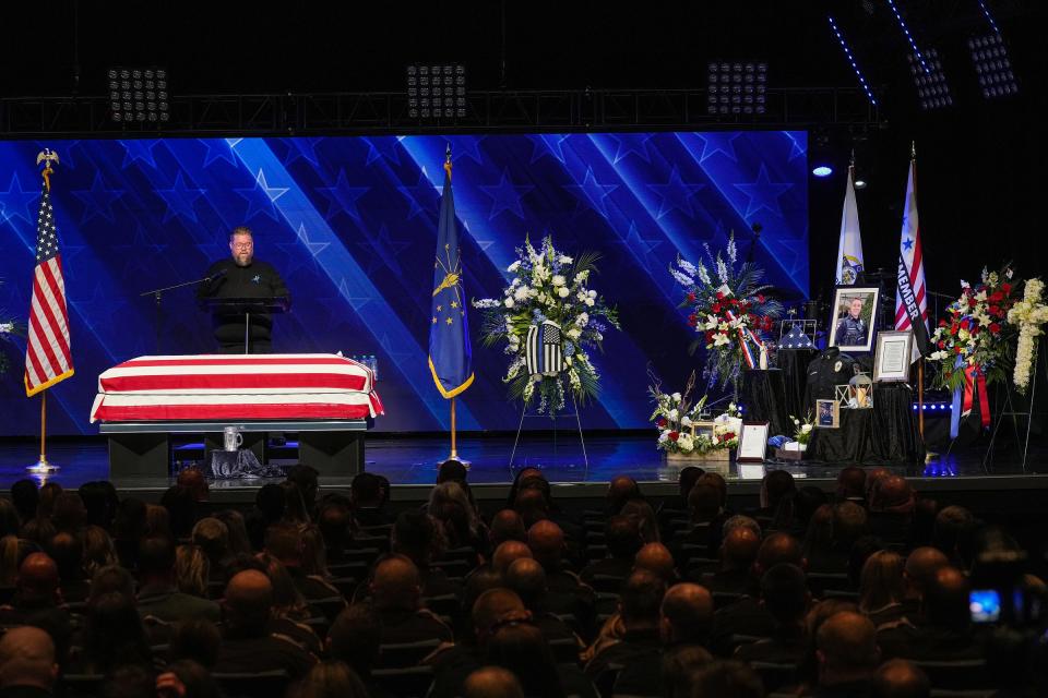 Pastor Larry Davis speaks at the funeral for 24-year-old Elwood police officer Noah Shahnavaz on Saturday, August 6, 2022, at ITOWN Church in Fishers, Ind. Shahnavaz was fatally shot while making a traffic stop in Madison County on July 31, 2022. 