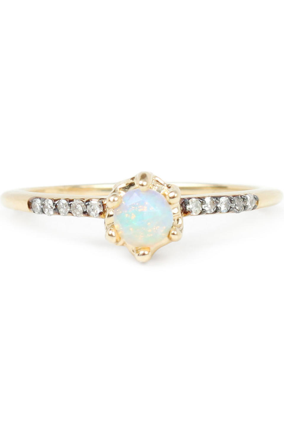 <p><em><span>Opal Entity Ring</span>, MANIAMANIA (Available at Catbird NYC), $1,800 </em></p><p><a rel="nofollow noopener" href="https://int.themaniamania.com/products/entity-solitaire-ring-yellow-gold-opal?region=INT" target="_blank" data-ylk="slk:BUY NOW;elm:context_link;itc:0;sec:content-canvas" class="link ">BUY NOW</a></p>