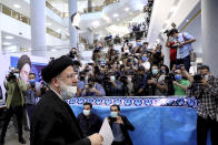 Ebrahim Raisi, head of Iran's judiciary attends the Interior Ministry to register his candidacy for the June 18 presidential elections at the elections headquarters of the Interior Ministry in Tehran, Iran, Saturday, May 15, 2021. (AP Photo/Ebrahim Noroozi)