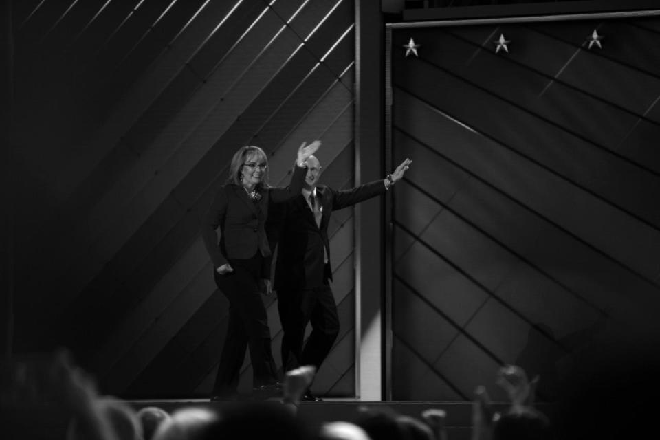 <p>Former Rep. Gabby Giffords, D-Ariz, and her husband Astronaut Mark Kelly (ret.), walk off the stage after speaking at the Democratic National Convention Wednesday, July 27, 2016, in Philadelphia, PA. (Photo: Khue Bui for Yahoo News)</p>