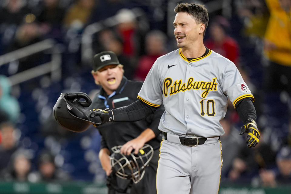 Pittsburgh Pirates' Bryan Reynolds (10) argues a called third strike with home plate umpire Mike Muchlinski during the seventh inning of the team's baseball game against the Washington Nationals at Nationals Park, Wednesday, April 3, 2024, in Washington. The Nationals won 5-3. (AP Photo/Alex Brandon)