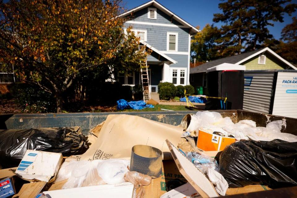 Debris from a home renovation sits in front of a home on Circle Avenue in Charlotte, N.C., Friday, Nov. 4, 2022. Alex Slitz/alslitz@charlotteobserver.com