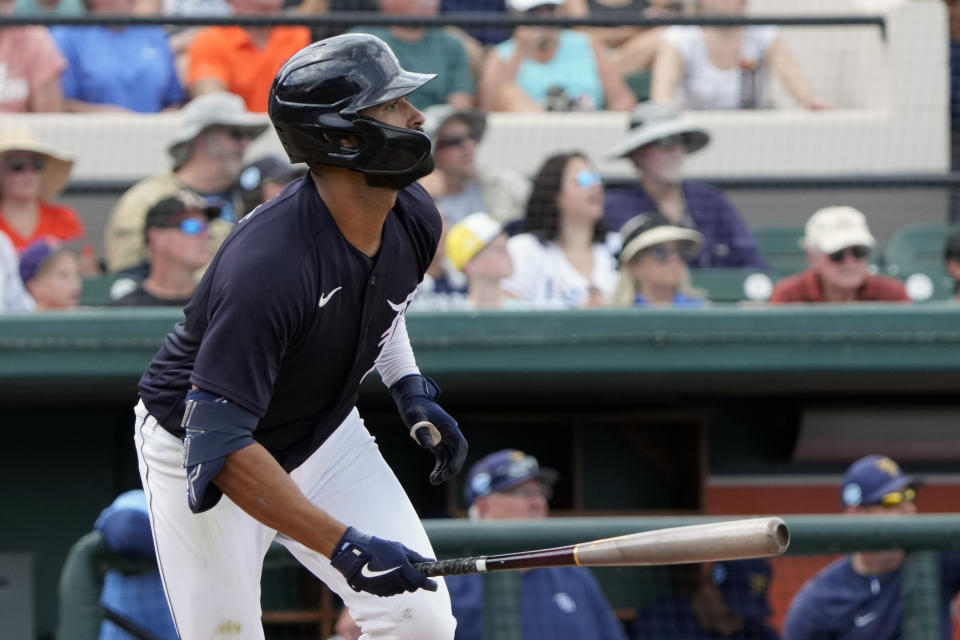 Detroit Tigers' Riley Greene watches his 3-run homer clear the left field wall in the fifth inning of a spring training baseball game against the Tampa Bay Rays, Sunday, March 26, 2023, in Lakeland, Fla. (AP Photo/John Raoux)