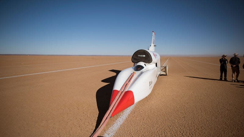 A photo of the Bloodhound rocket car in a desert. 