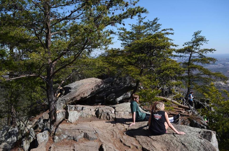 Visitors enjoing the views from Crowders Mountain, about 31 miles outside of Charlotte.