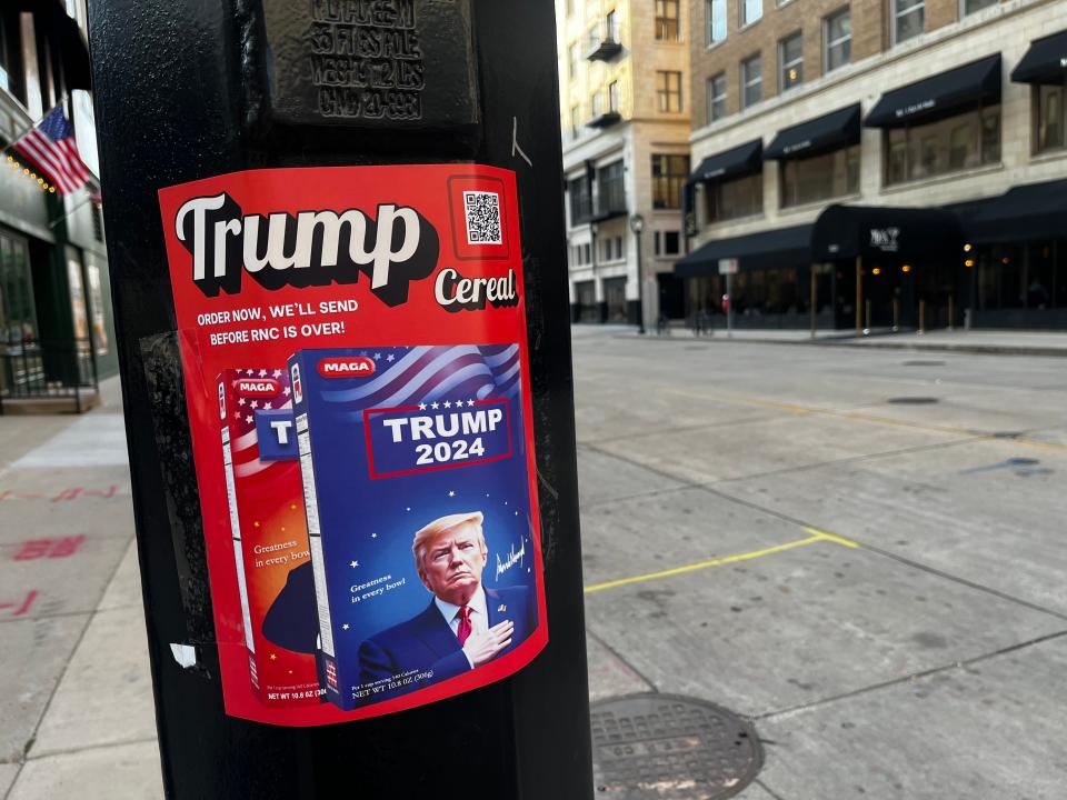 Posters for Trump cereal are advertised around the "soft" pedestrian zone at the Republican National Convention in Milwaukee on Monday, July 15, 2024.