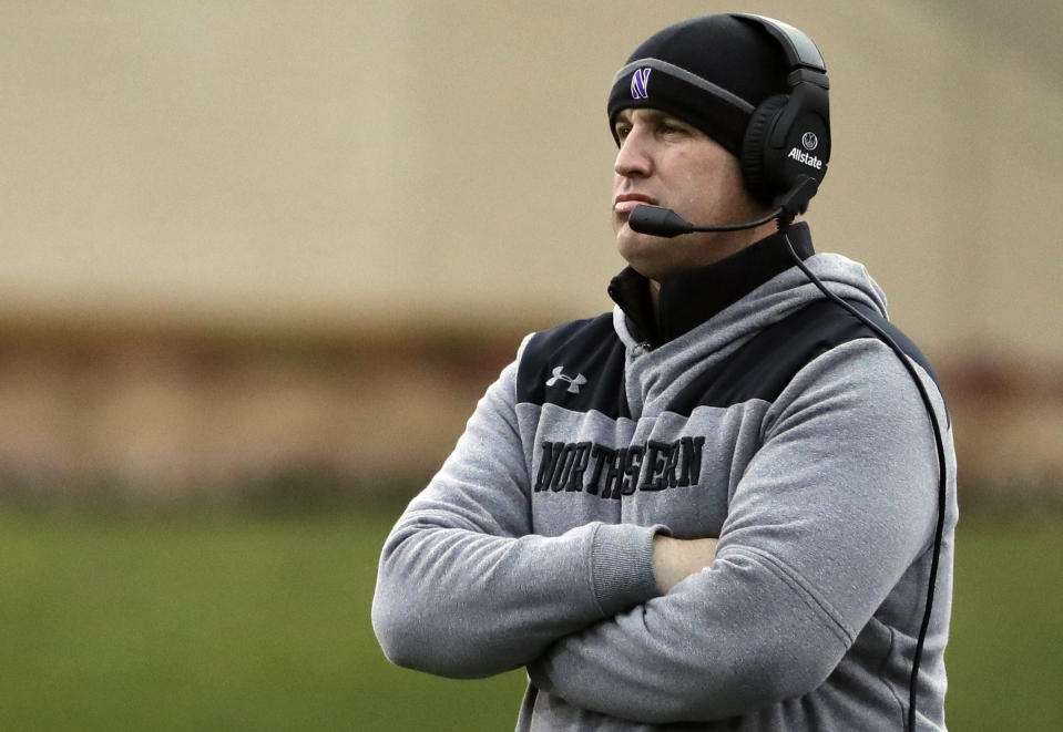 FILE - In this Nov. 24, 2018, file photo, Northwestern head coach Pat Fitzgerald watches his team during the first half of an NCAA college football game against Illinois in Evanston, Ill. No. 21 Northwestern set to face No. 6 Ohio State in the Wildcats’ first Big Ten championship game appearance on Saturday, Dec. 1, 2018, in what could be a signature moment for a consistent winner trying to earn its spot among the conference’s elite. (AP Photo/Nam Y. Huh, File)