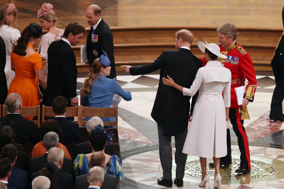 Harry and Meghan interact with Princess Beatrice,  Edoardo Mapelli Mozzi, and Princess Eugenie.