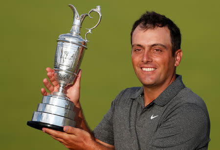 Golf - The 147th Open Championship - Carnoustie, Britain - July 22, 2018 Italy's Francesco Molinari celebrates with the Claret Jug after winning the 147th Open Championship REUTERS/Paul Childs