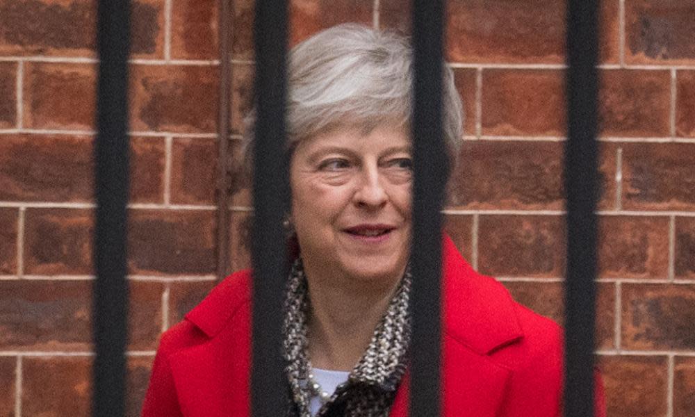 Theresa May at the rear entrance of No 10 Downing Street on Friday.