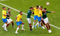 <p>Brazil’s Casemiro and Gabriel Jesus in action with Mexico’s Edson Alvarez REUTERS/David Gray </p>