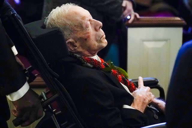 <p>ALEX BRANDON/POOL/AFP via Getty</p> Former President Jimmy Carter at the funeral service for his wife, Rosalynn, on Nov. 29, 2023