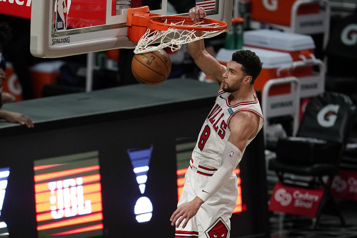 Chicago Bulls guard Zach LaVine scores on a breakaway dunk 