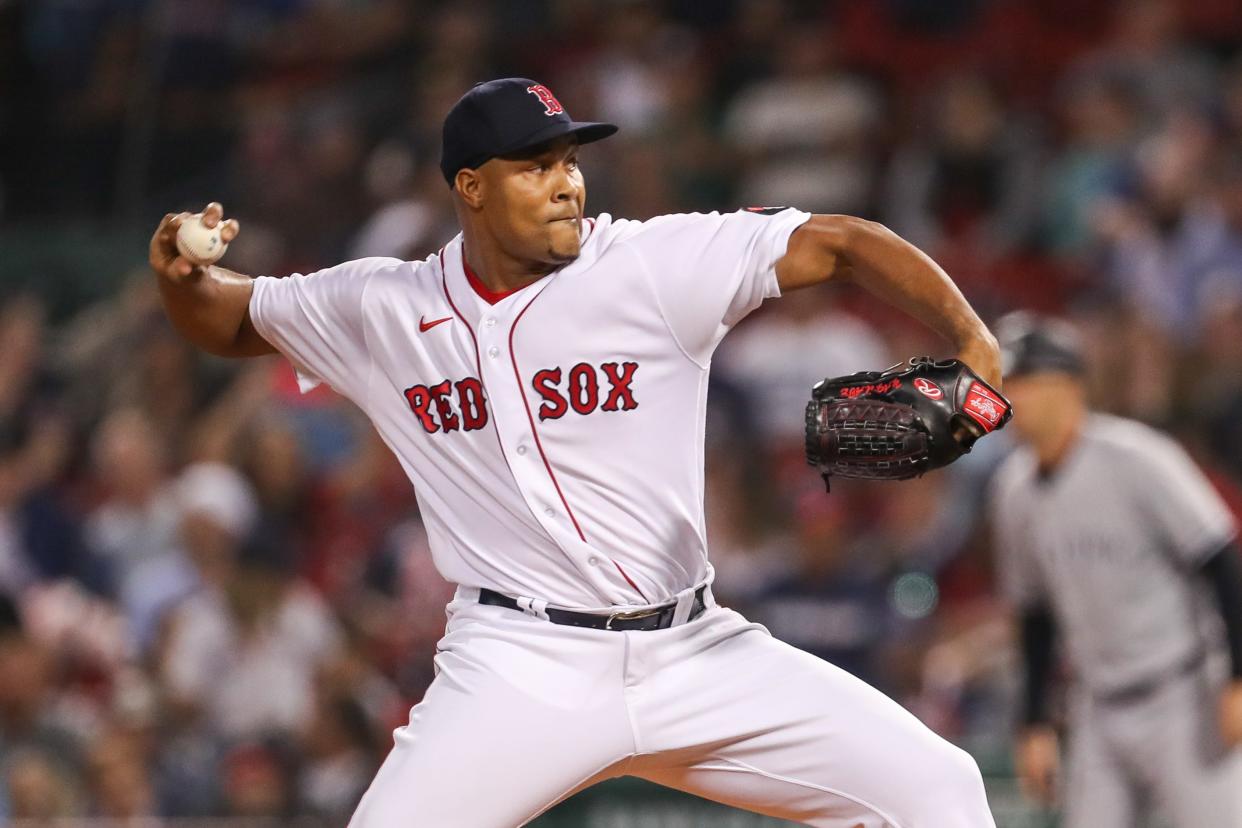 Boston Red Sox relief pitcher Jeurys Familia (31) delivers a pitch during the tenth inning against the New York Yankees at Fenway Park in Boston on Sept. 13, 2022.